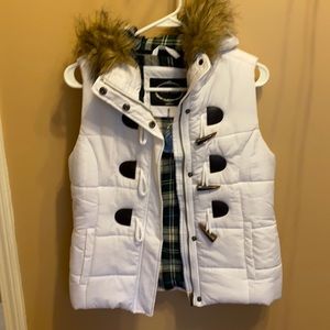 Fur lined vest. Brand new